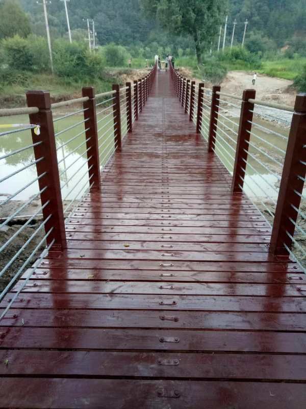 Anticorrosive wooden suspension bridge